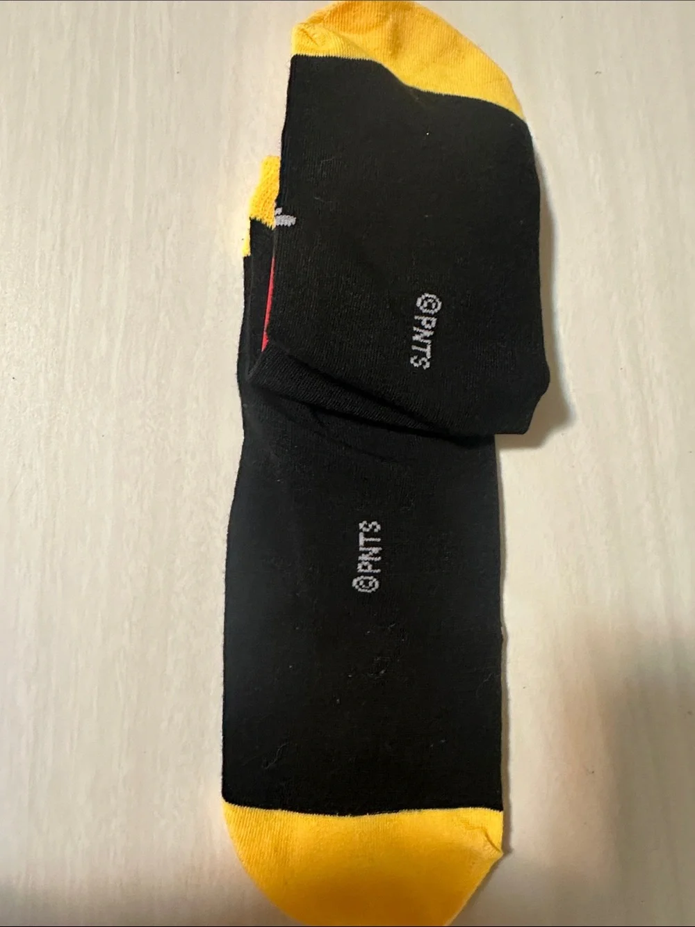 Peanuts Snoopy Athletic No-Show Socks in Black and Yellow